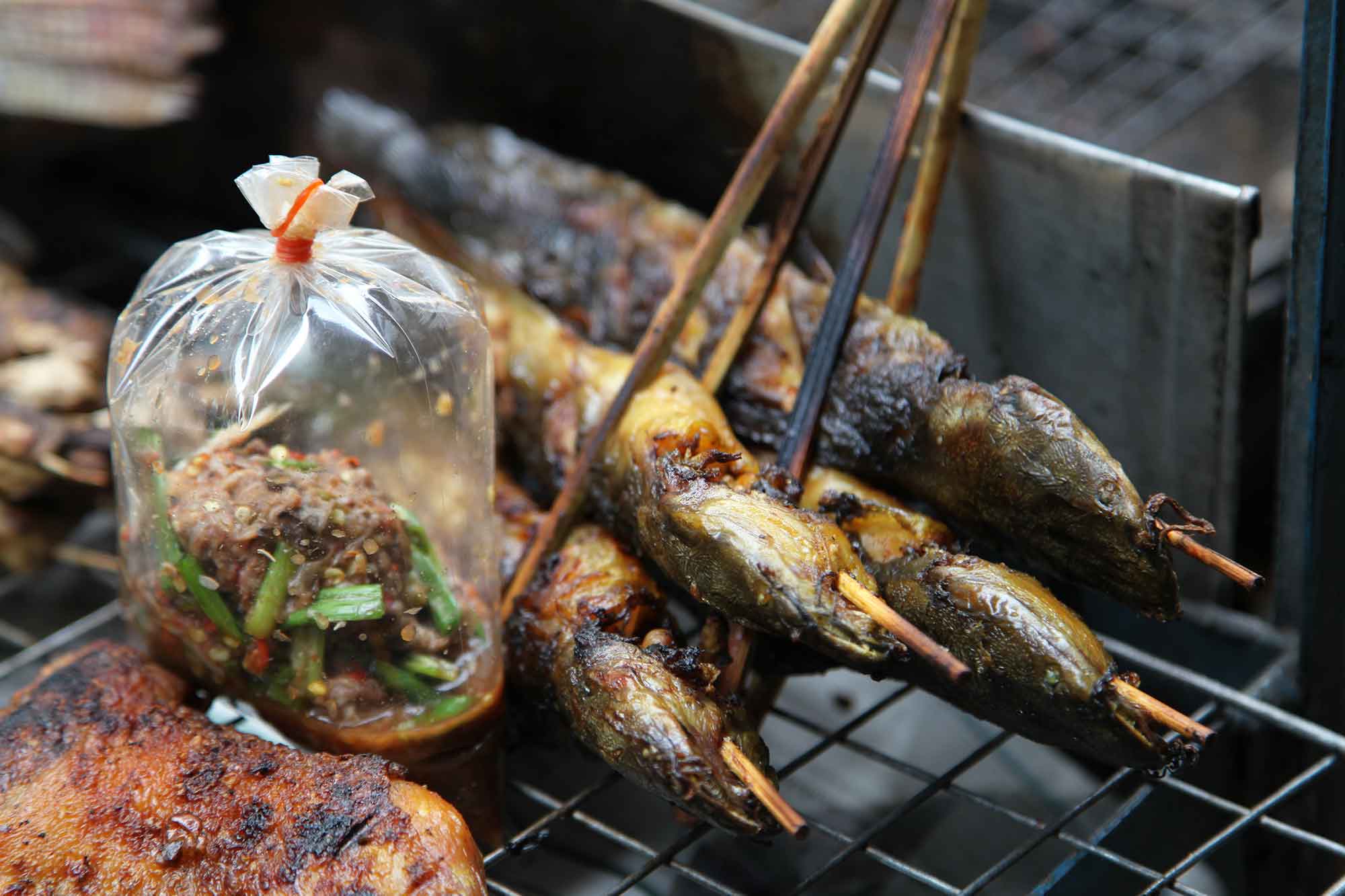 Fried fish at a food stall in Bangkok, Thailand. © Ulli Maier & Nisa Maier